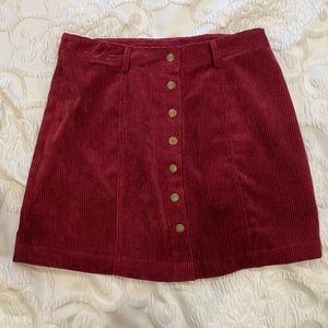 Red Favlux skirt with button up front